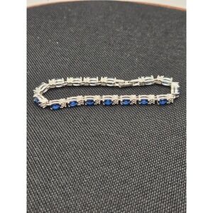Avon Silver Tone Faux Blue Sapphire and Rhinestone Tennis Bracelet 6.75 Inch
